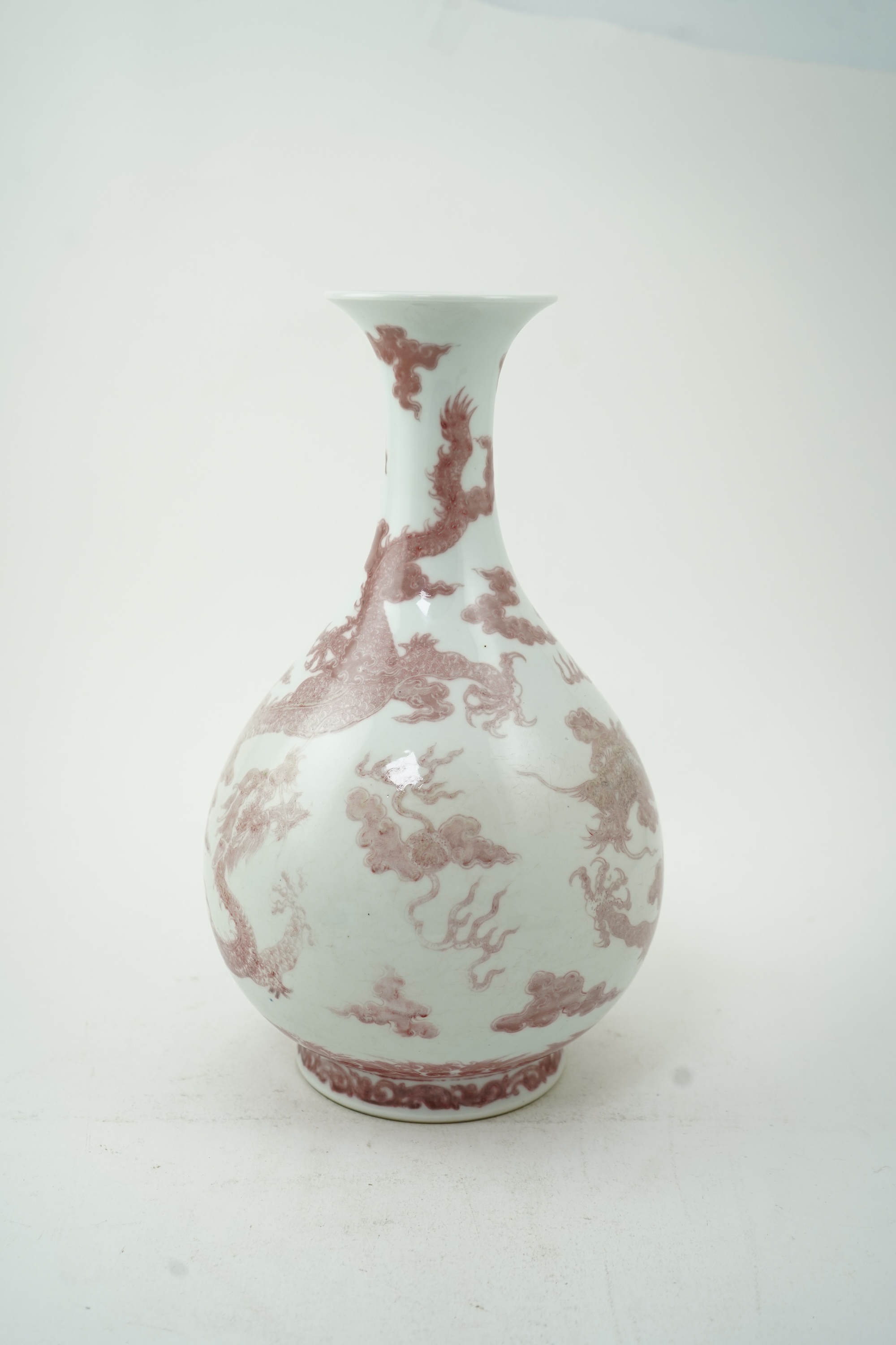 A Chinese underglaze copper-red ‘dragon’ bottle vase, yuhuchunping